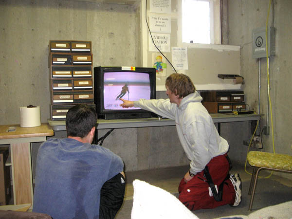 Coach Terry McLeod doing video analysis