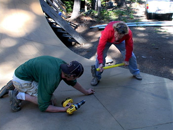 Rick and Mark repairing the skate ramp